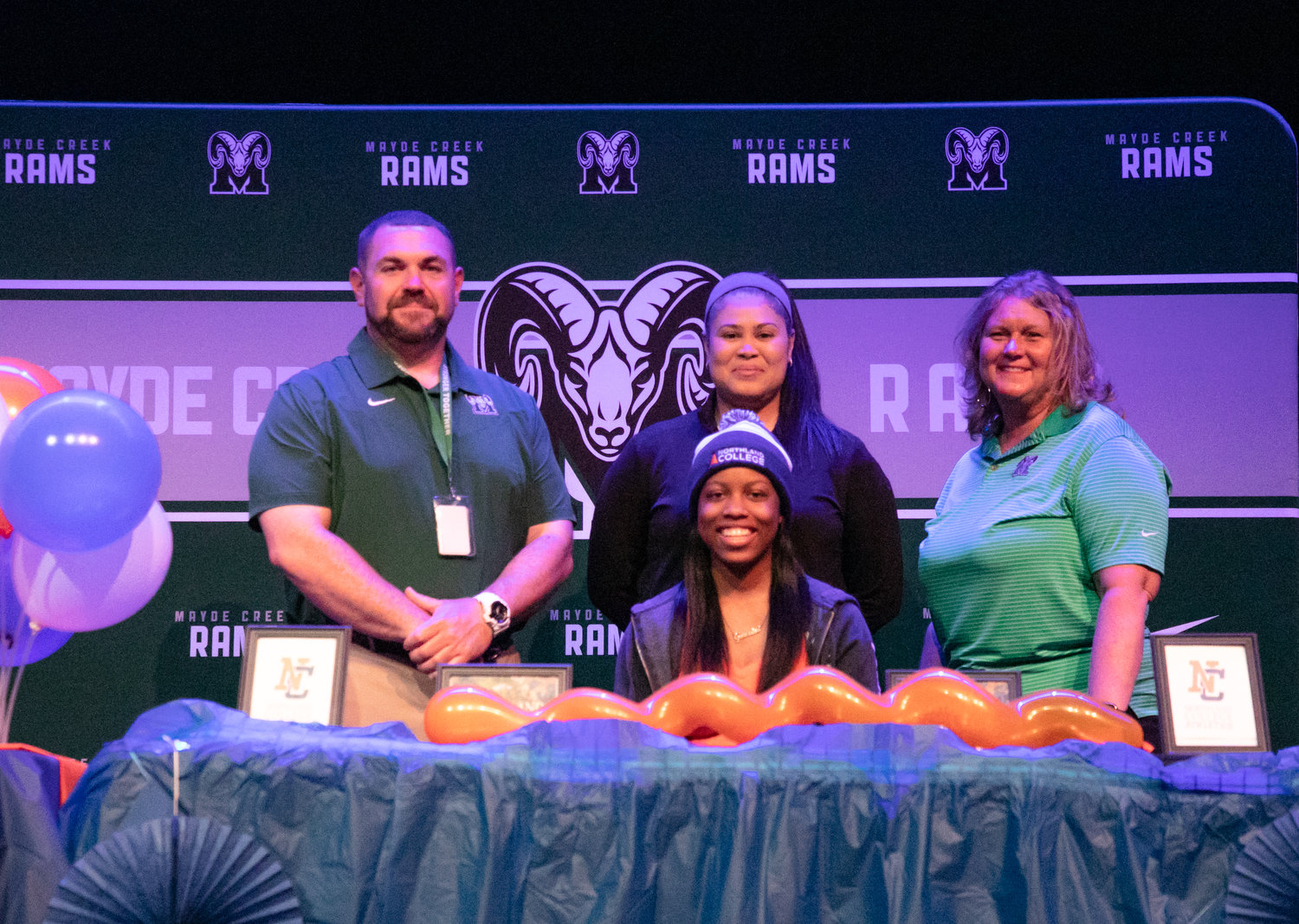 Mayde Creek's Madison Mathis signed to play basketball at Northland College.